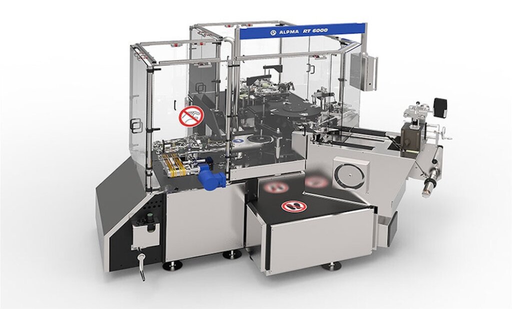 RT 6000 Packaging Machine – Automated machine for portioning, packaging, and canning soft cheese portions, featuring stainless steel construction, a rotary table system, and an integrated control panel.