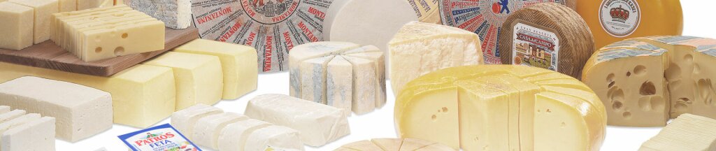 A wide variety of cheese types in various shapes and sizes—including slices, blocks, and wheels—arranged for raw product automation.