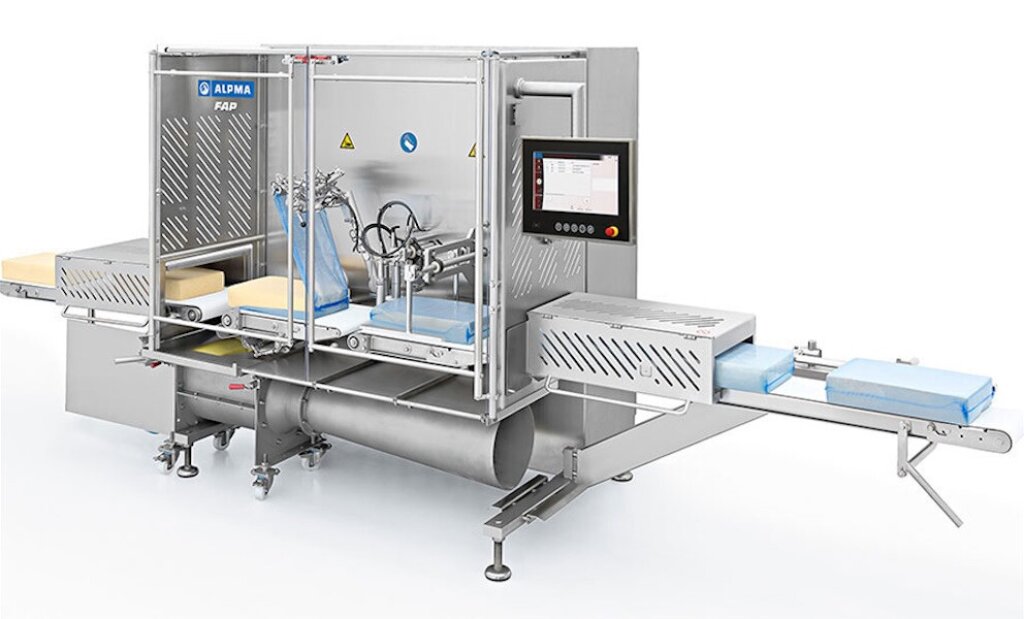 Industrial FAP film-removal machine for the automatic unwrapping of film-ripened cheese blocks, featuring a stainless steel housing, conveyor belt, and control panel.