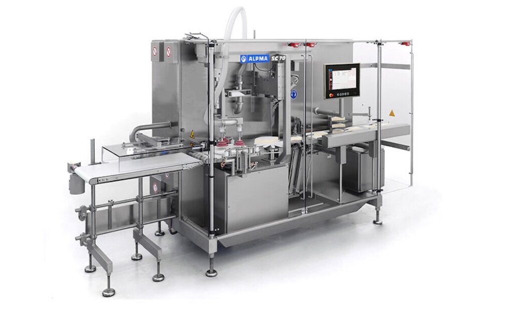 Segment Cutter SC 70 – Industrial cutting machine for precisely cutting Brie wheels into segments, featuring a stainless steel housing, conveyor belt, and touchscreen control panel.