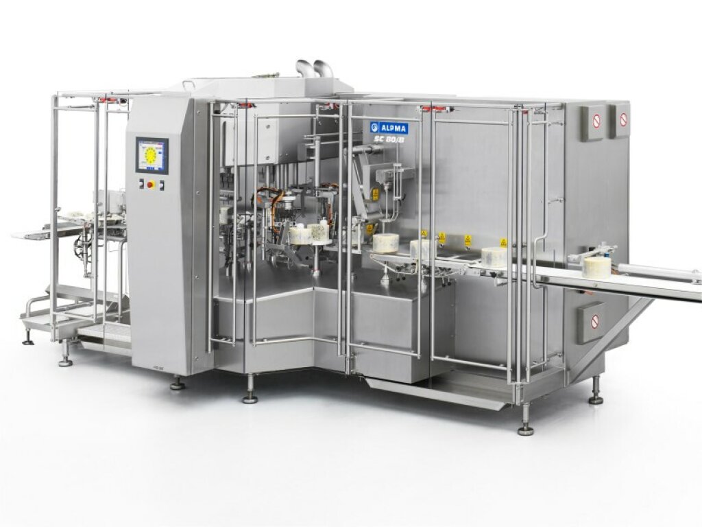 Segment Cutter SC 80/B – Industrial cutting machine for the flexible cutting of blue cheese wheels, featuring a stainless steel housing, conveyor belt, and integrated control panel.